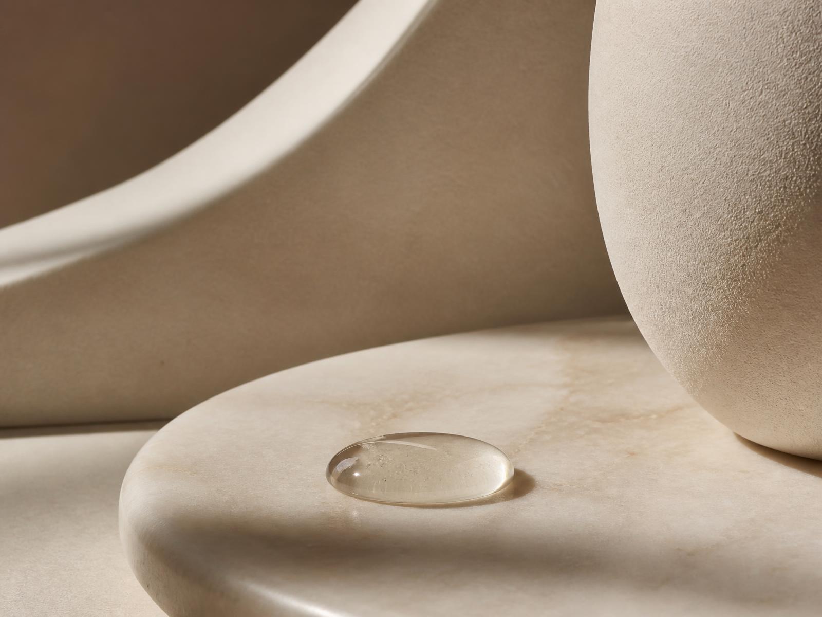 Sculptural forms in bone and clay tones representing piani. skincare